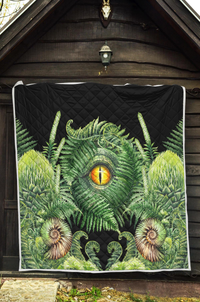 Green dinosaur eye quilt with fern leaves and seashells; black diamond quilting
