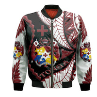 Unisex bomber jacket with dark base and colorful tribal pattern, zip front, ribbed cuffs