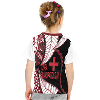 Kid T-shirt back view with black, red, and white geometric design and large cross