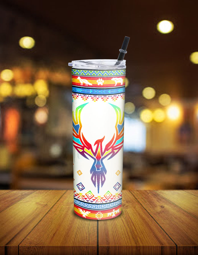 Skinny tumbler with multicolor Native American deer skull design and clear lid with straw