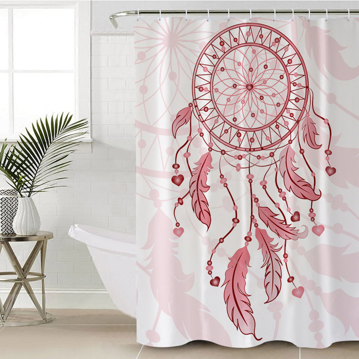 Pink dreamcatcher shower curtain with circular web, feathers and hanging heart beads