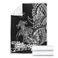 Black hammerhead shark blanket with tribal sail design, folded with white reverse side