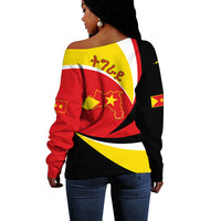 Women’s off-shoulder sweater, Tigray flag print back with map outline and star motifs