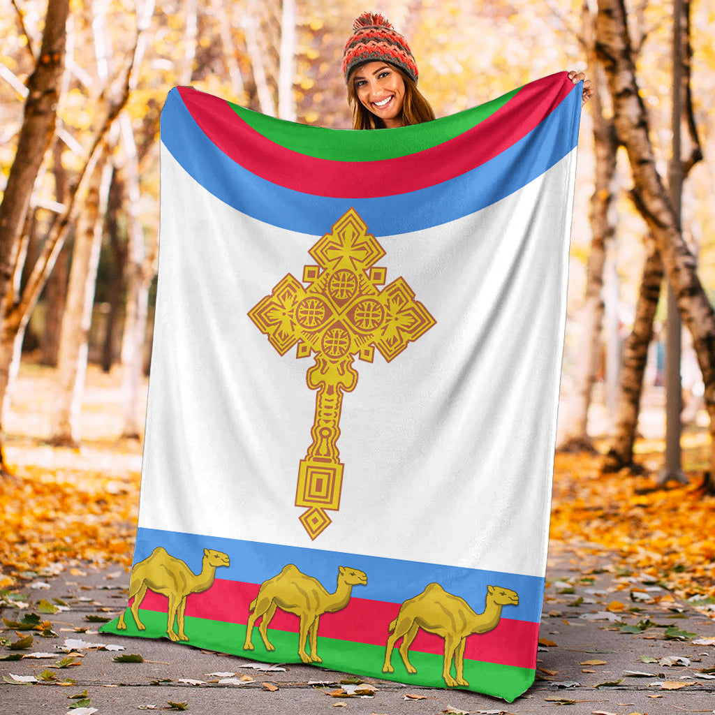 Eritrea cross-flag blanket, white base with blue/red/green stripes and gold camel figures