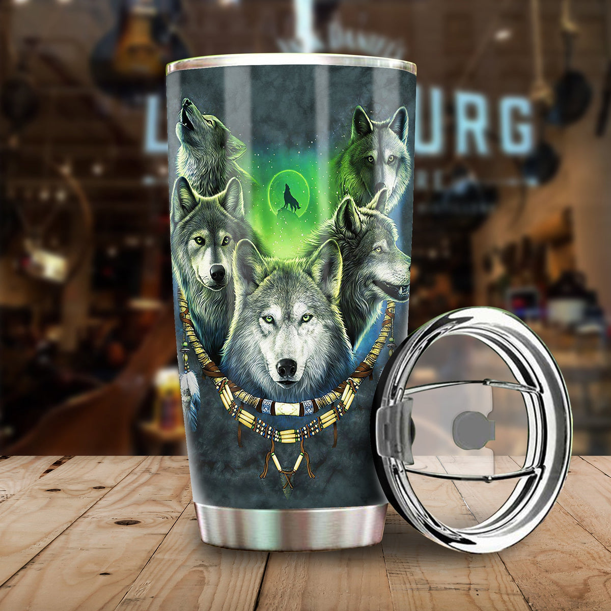 20oz stainless tumbler with open lid, multicolor wolf pack graphic on front