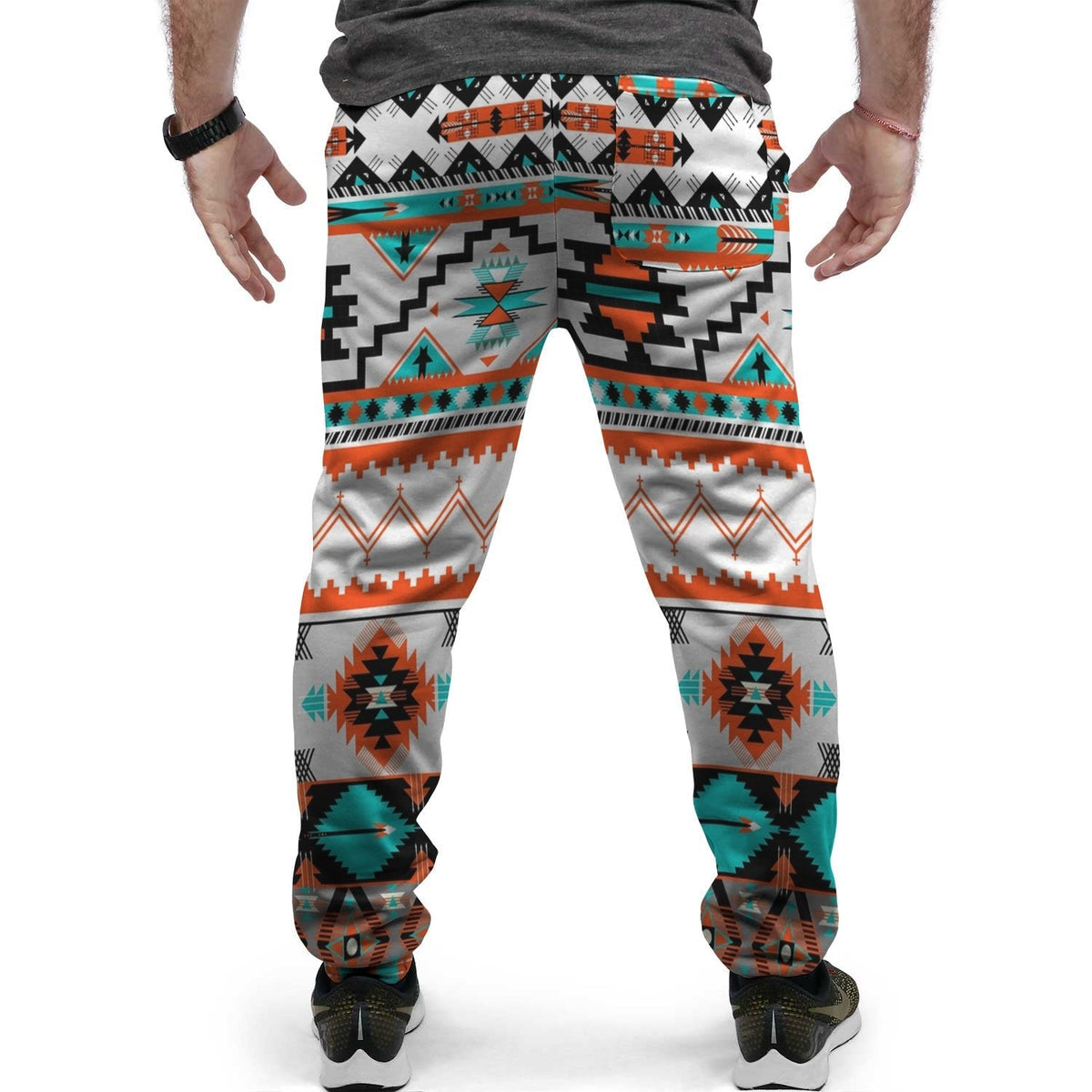 White jogger pants with Native-style diamond, zigzag motifs and elastic waistband