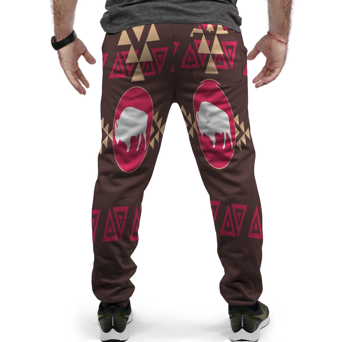 Brown joggers with tribal geometric print, large bison ovals on thighs, elastic cuffs