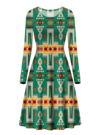 Green long-sleeve A-line dress with Native-inspired geometric multicolor print