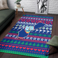 Blue Guam Christmas area rug on dark floor with colorful holiday stripes and Guam map