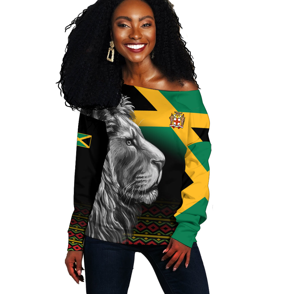 Off-shoulder sweater: Jamaican stripes & lion face print, black base
