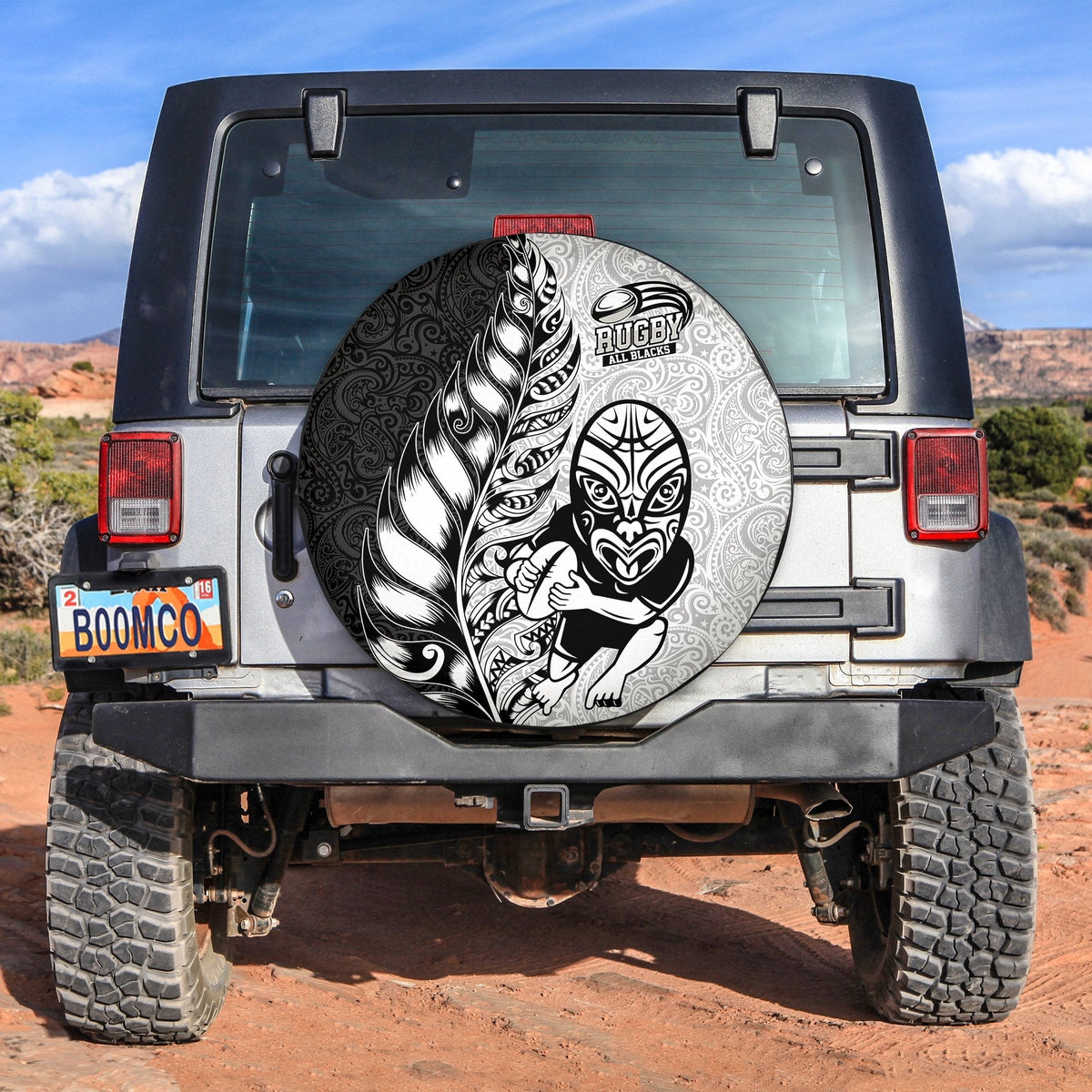 Spare tire cover with circular black-and-white Maori rugby graphic