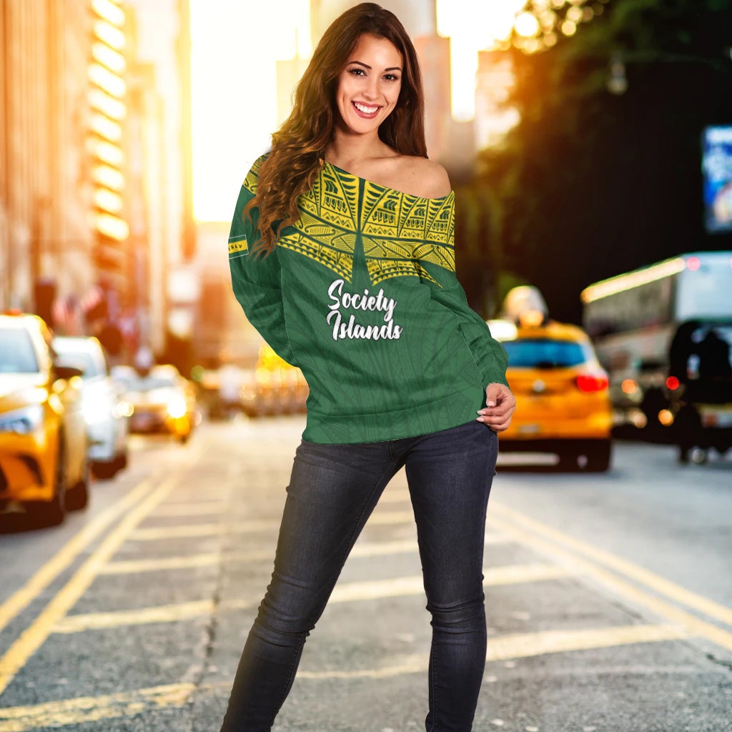 Green off-shoulder sweater with yellow patterned yoke and centered 'Society Islands' text
