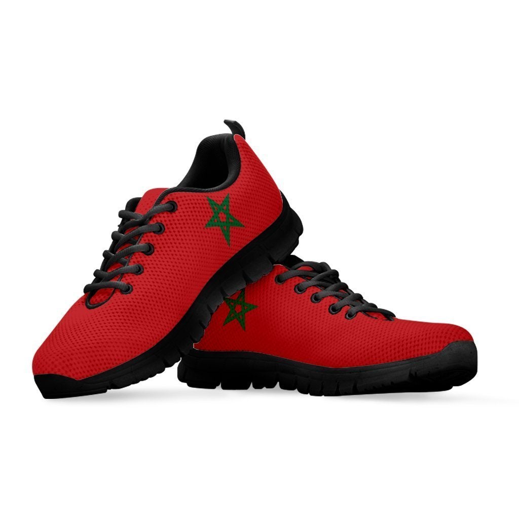 Red Morocco-flag sneakers with green star accents and black outsole, lace-up pair