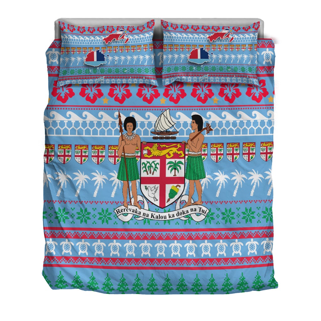 Blue bedding set showing three-panel design: dancers, sailboat, shields, and holiday pattern