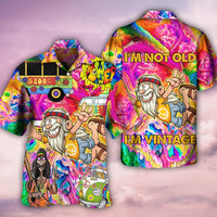 Colorful Hawaiian shirt with 'I'M NOT OLD' and 'I'M VINTAGE' graphic text