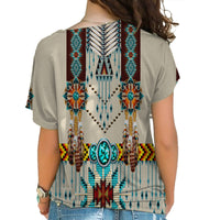 Back view: women’s cross-shoulder shirt with turquoise and beaded tribal pattern
