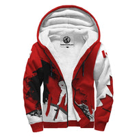 Sherpa Hoodie: red zip-up with hood and maple leaf graphic
