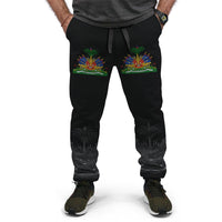 Black joggers with drawstring waist, colorful crest panels, and palm print cuffs