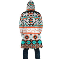 Back view hooded Native American style cloak, multicolor geometric stripes and motifs