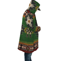 Hooded cloak side view, Southwest green and geometric native-style symbol pattern