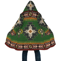 Close-up front view of hooded cloak, Southwest green diamond and stripe symbols