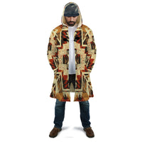 Hooded native-style cloak with colorful geometric pattern, yellow-beige red and black