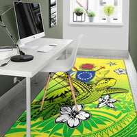 Green Polynesian turtle area rug with star circle, bird and flower designs, rectangular