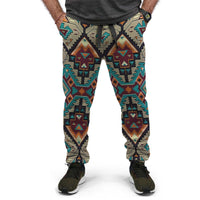 Jogger pants shown front view with bold geometric print in teal, tan, orange and black
