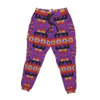 Purple jogger pants flat lay, multicolor geometric Native-style print, elastic waistband