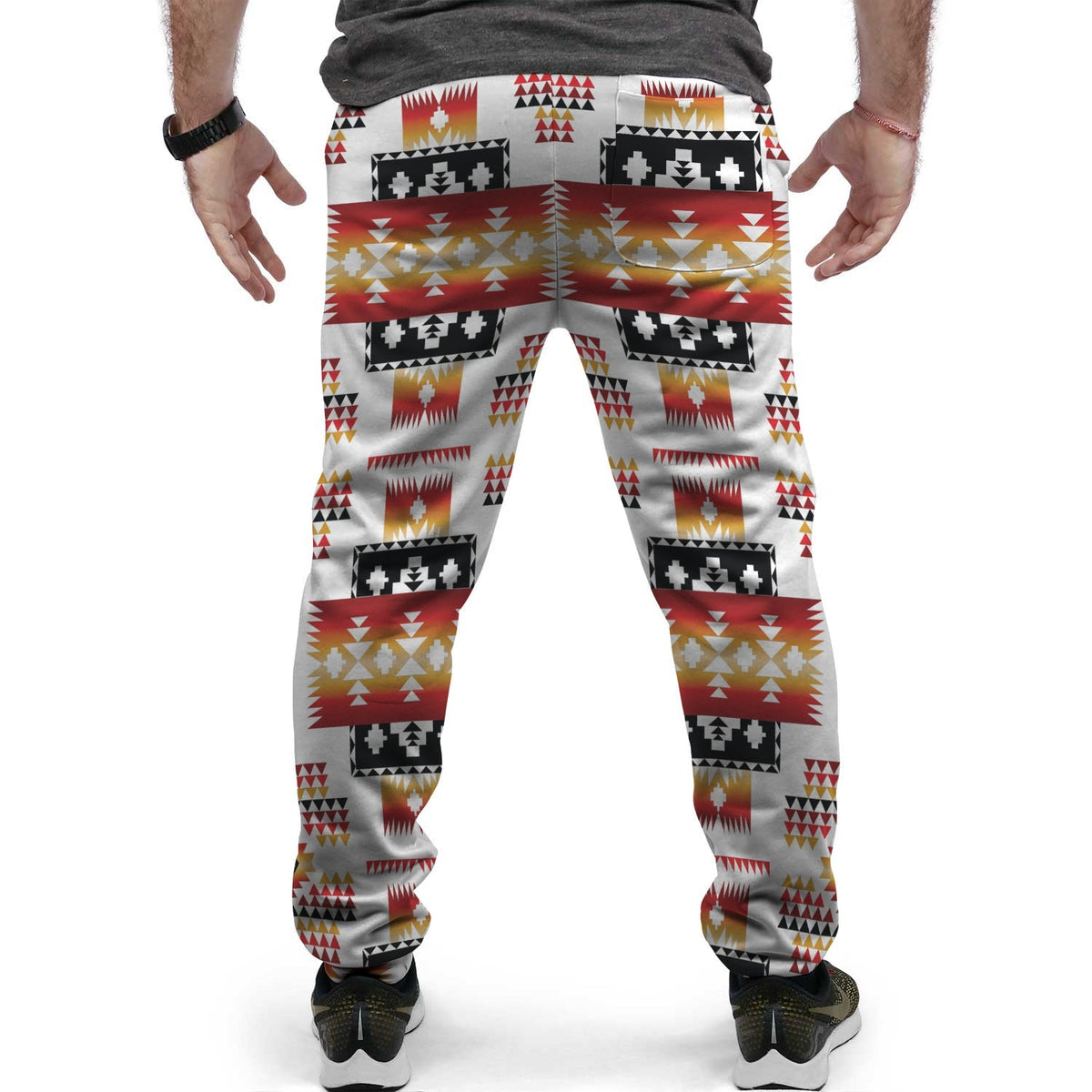 Back view of light gray jogger pants with multicolor Native-style geometric print.