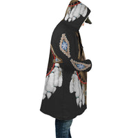 Black hooded jacket side view with brown wolf face, white feather accents, colorful bands