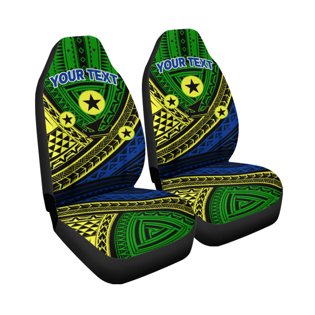 Isolated set of green/blue tribal seat covers with “YOUR TEXT” and star motifs