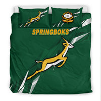 Green bedding set with two pillowcases and duvet, featuring 'SPRINGBOKS' and antelope graphic