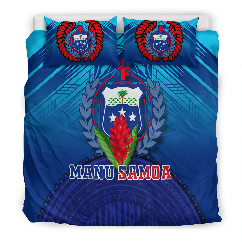 Blue Manu Samoa crest bedding set with two front pillows showing red laurel wreath design