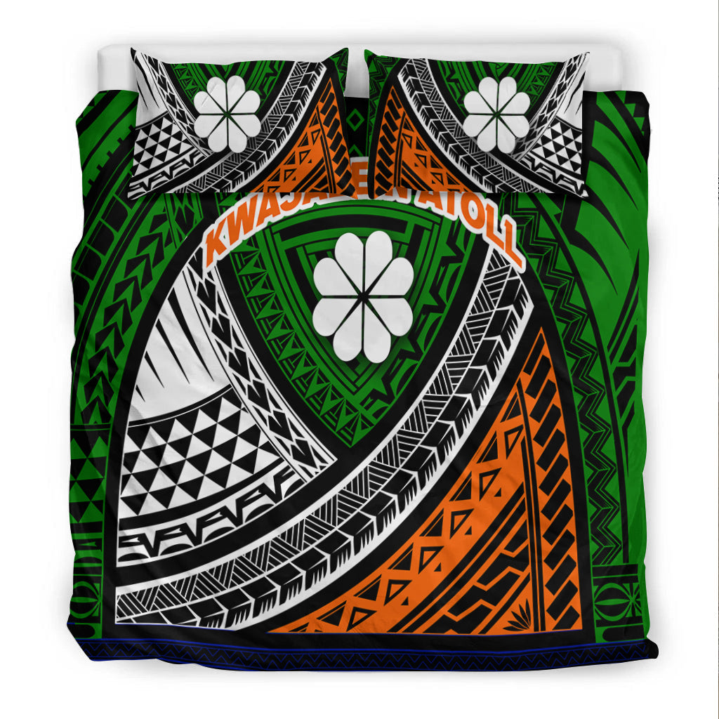 Close view of green tribal bedding set: black-and-white curved patterns, orange panel, blue edge.