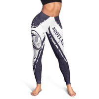 Back view of navy and white leggings with 'SCOTLAND' text and diagonal panels