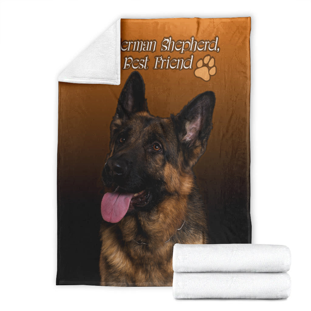 Orange German shepherd blanket with paw print and bold text, folded edge view