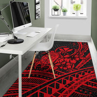 Red and black tribal area rug featuring turtle, hibiscus, and aztec-style bands