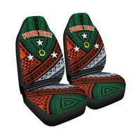 Two-piece green tribal seat covers with orange stripes, white motifs, black bases, 'YOUR TEXT'