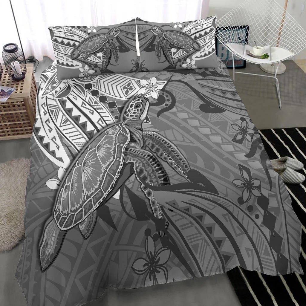 Gray bedding set featuring large turtle artwork and tribal border on duvet