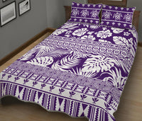 Purple quilt bed set with floral and geometric stripe patterns; matching pillow shams