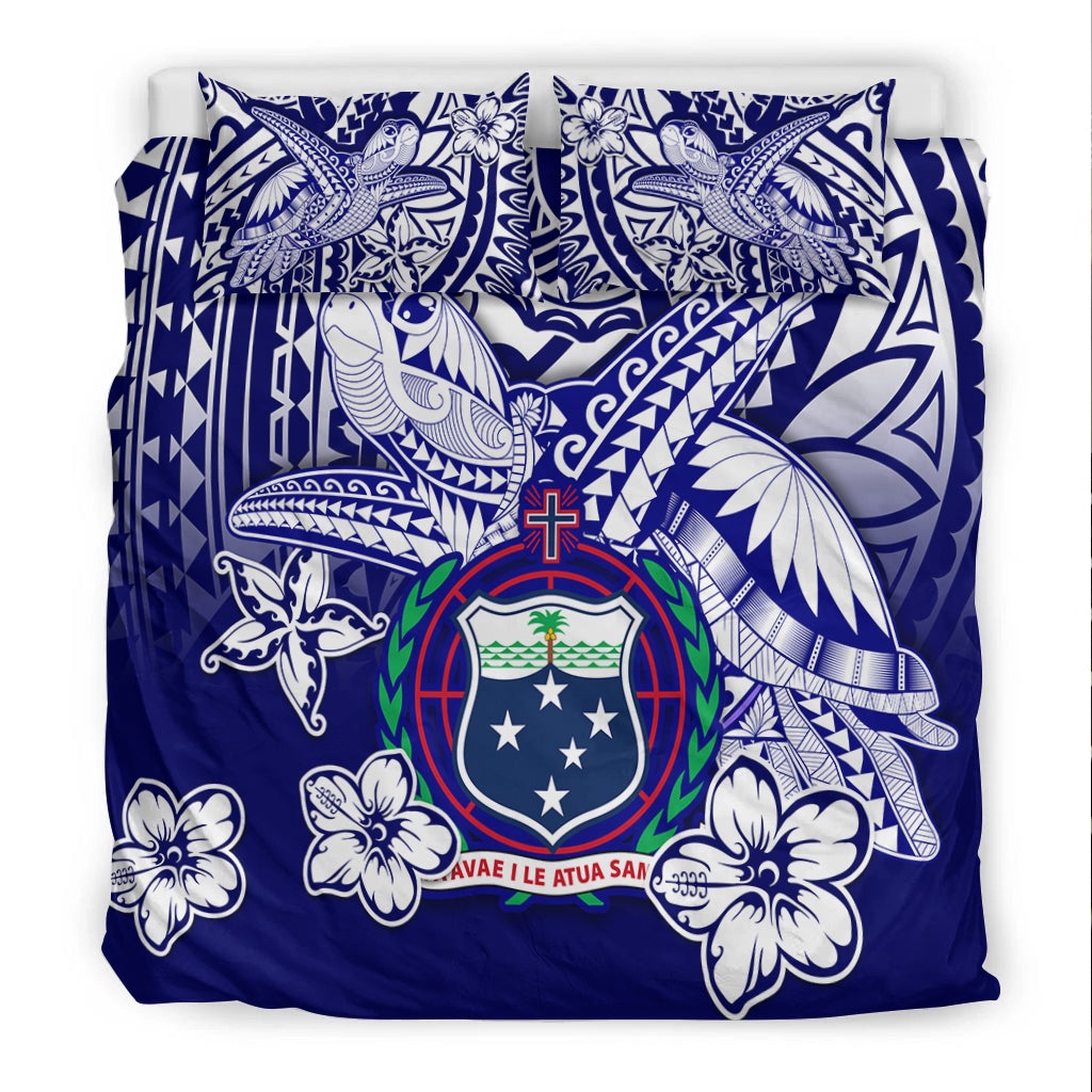 Blue duvet cover with turtle and floral Polynesian patterns, shield crest emblem