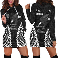 Black hoodie dress with white patterned hem and eagle graphic