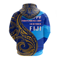 Back of zip hoodie with gold swirls over blue fabric and Fiji Independence Day graphic