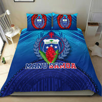 Blue Manu Samoa comforter with two crest pillows and bold 'MANU SAMOA' lettering