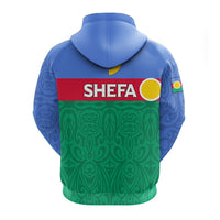 Back view pullover hoodie with Shefa text and flag graphic, blue top, green lower panel