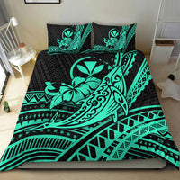 Turquoise & black Hawaiian bedding set on bed with humpback whale, hibiscus tribal print, two pillows