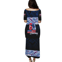 Black long puletasi dress with blue pattern yoke and 60th Independence anniversary text