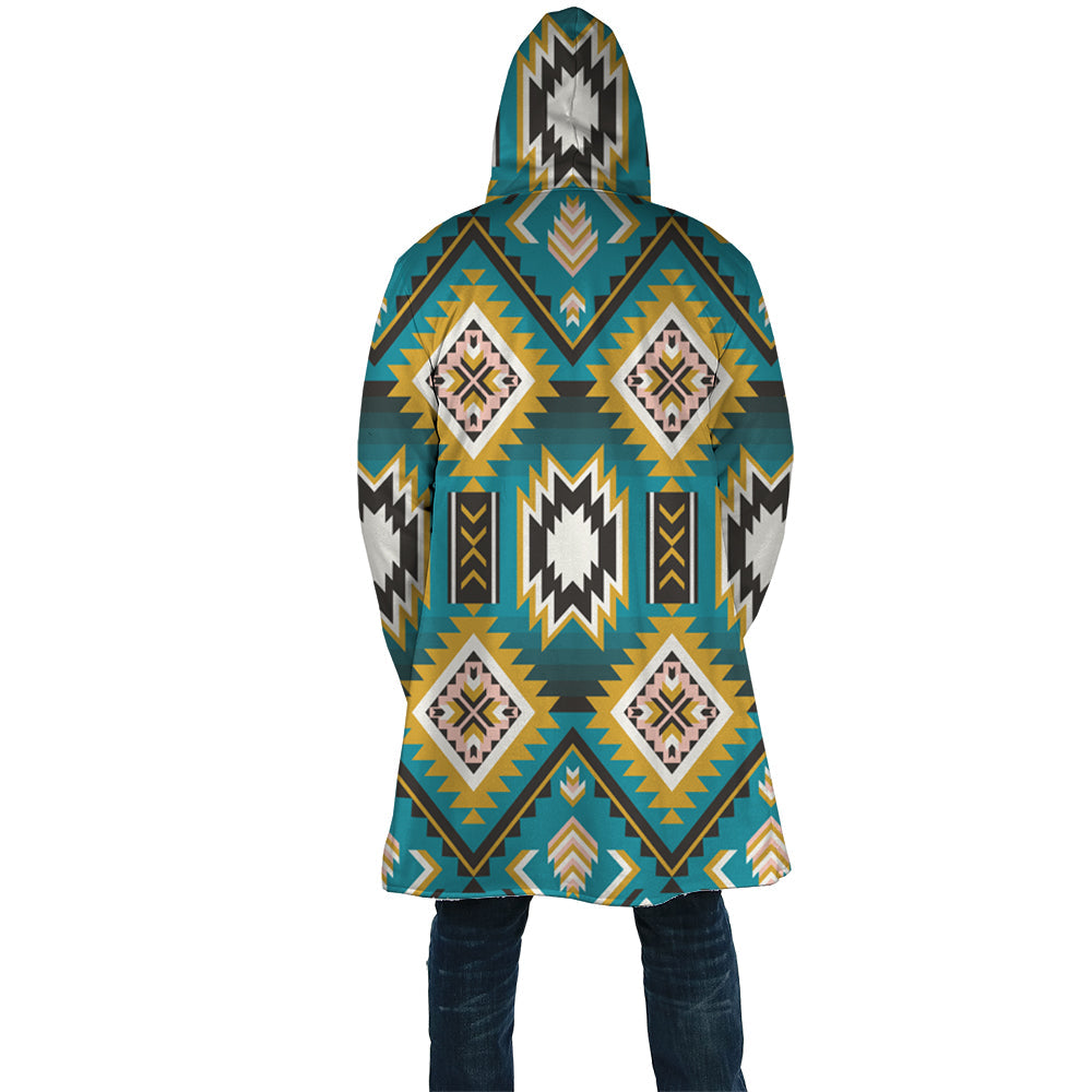 Turquoise geometric-pattern hooded cloak back view with full-length drape and hood