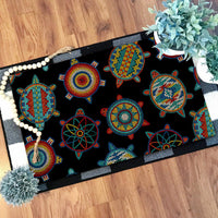 Black doormat with multicolor Native American turtle pattern and beaded-style border